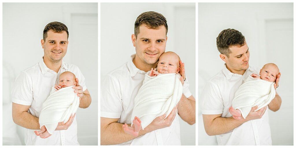 Father holding sleeping newborn baby boy in Indianapolis studio