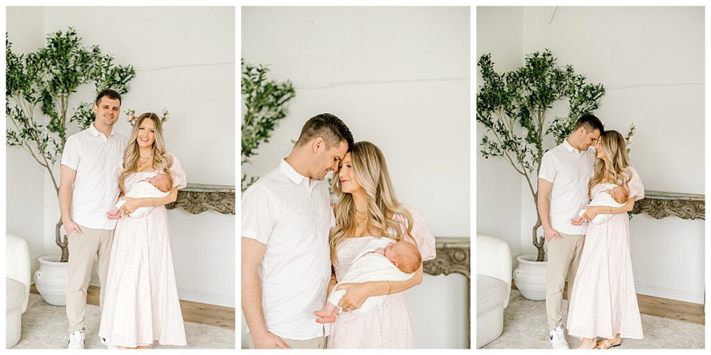 Family holding newborn baby in cozy downtown Indianapolis studio