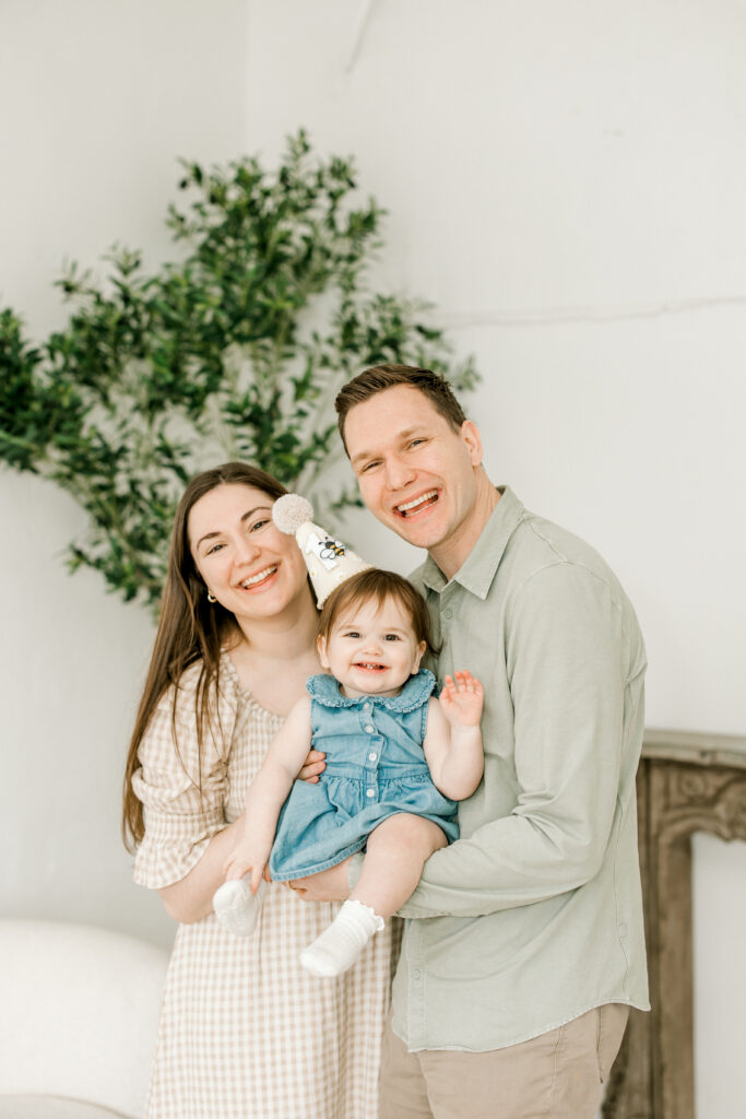 Pearsall family with one year old baby during studio milestone session