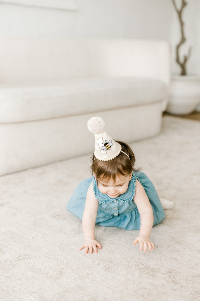 One year old baby portrait with neutral backdrop in studio