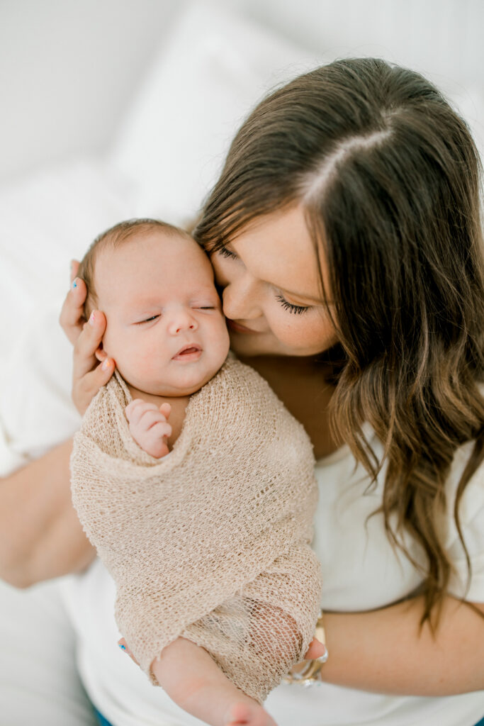 Seven-week-old Baby Beau sleeping in a wrap during downtown Indianapolis newborn session