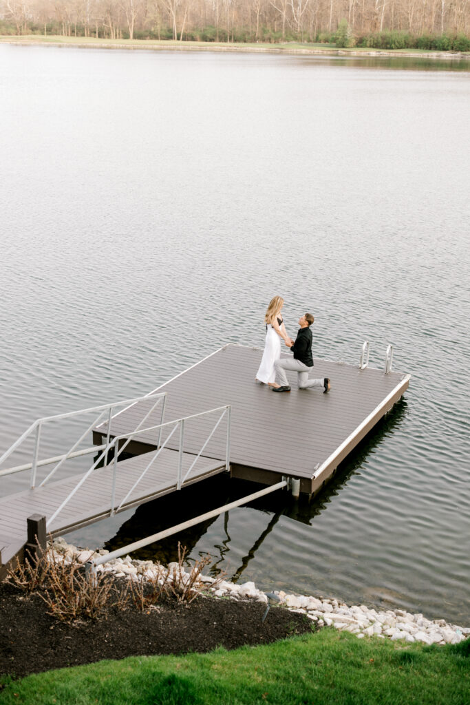 Surprise proposal setup at lake house in Fishers Indiana with waterfront view